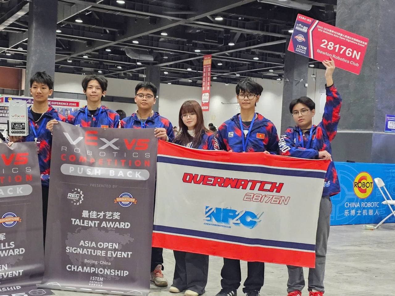 Team Overwatch 28176N with the Talent Award banner at the VEX Asia Open in Beijing